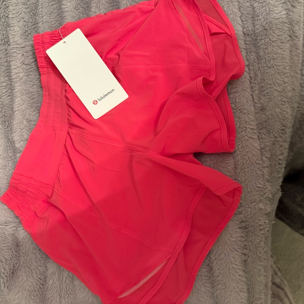 Lululemon Hotty Hot 4” watermelon Pink Athletic Shorts. Size 4. New with tags.